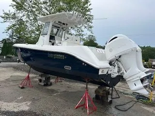 Slide: The Image of 2017 Everglades 255 Center Console boat on stands. - 4