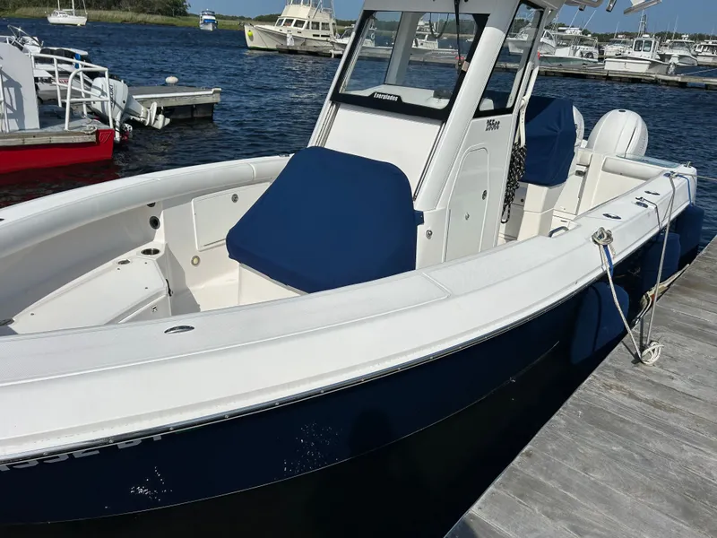 Slide: The Image of 2017 Everglades 255 Center Console boat at dock. - 7
