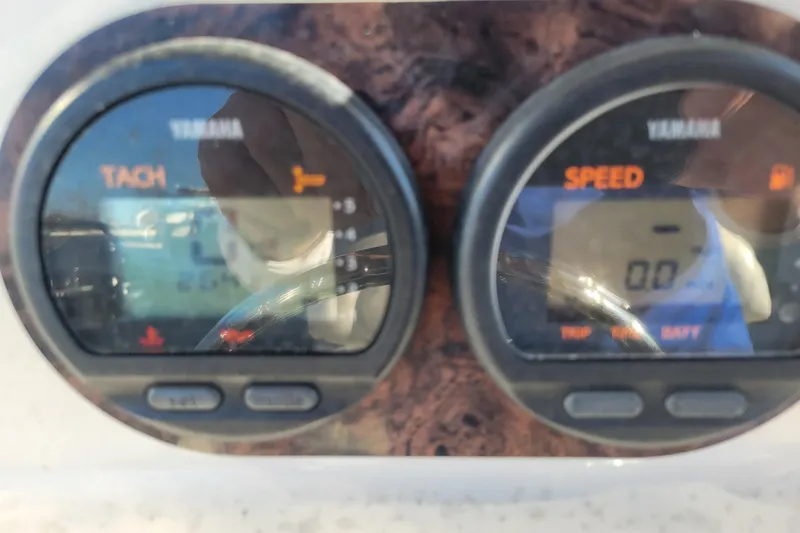 Slide: The Image of Close-up of Yamaha tachometer and speedometer on 2008 Cobia 235 Center Console boat. - 7