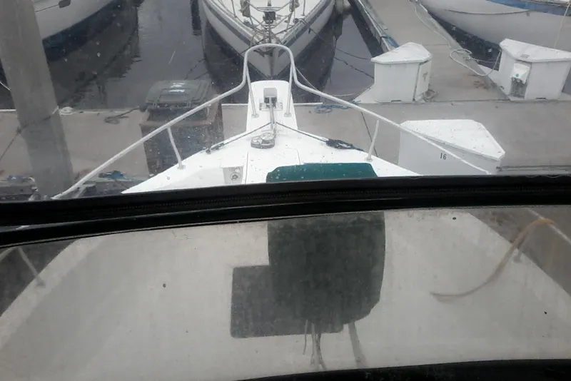 Slide: The Image of 1997 Mainship 350 yacht docked at marina, view from helm. - 17