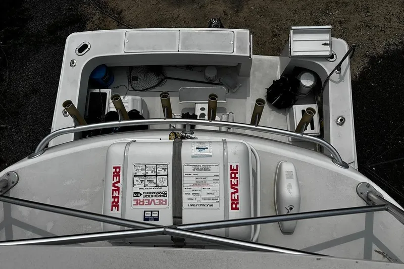 Slide: The Image of Top view of 2002 Luhrs 40 Open boat deck with fishing rod holders. - 18