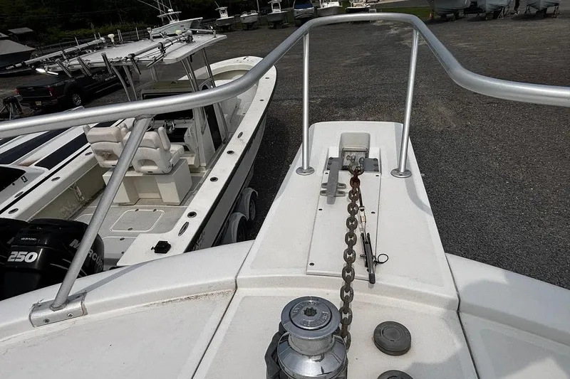 Slide: The Image of Bow view of 2002 Luhrs 40 Open boat with anchor chain and railing. - 24