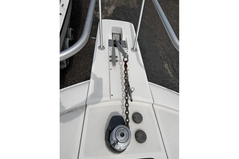 Slide: The Image of Bow of 2002 Luhrs 40 Open boat with anchor chain and winch. - 25
