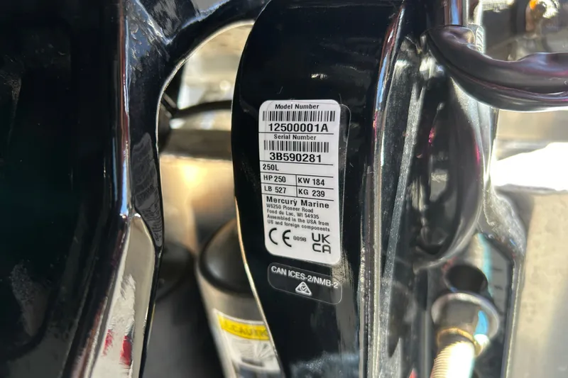 Slide: The Image of Label on Sun Tracker Party Barge 24 XP3, 2026 model, showing specifications and serial number. - 91
