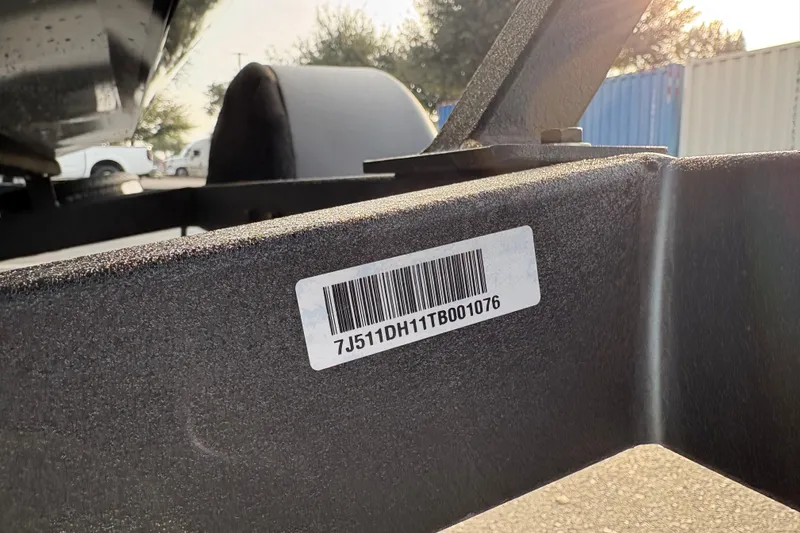 Slide: The Image of Barcode on 2026 Tracker Pro Team 175 boat trailer, outdoor setting. - 76