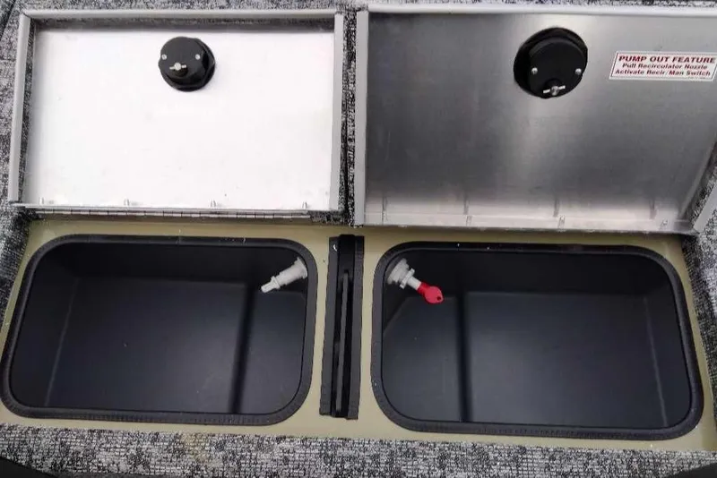 Slide: The Image of 2026 Tracker Pro Team 195 livewell compartments with pump-out feature and secure lids. - 5