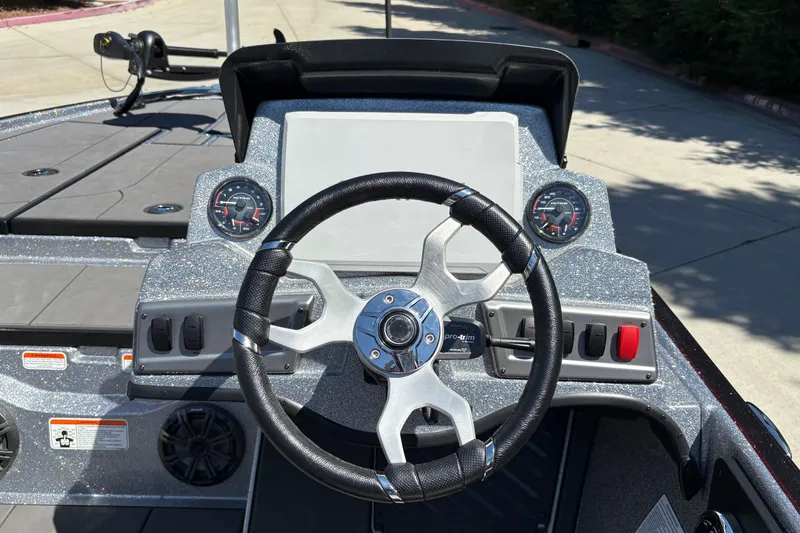 Slide: The Image of Steering console of 2026 Nitro Z19 XL boat with modern gauges and controls. - 22