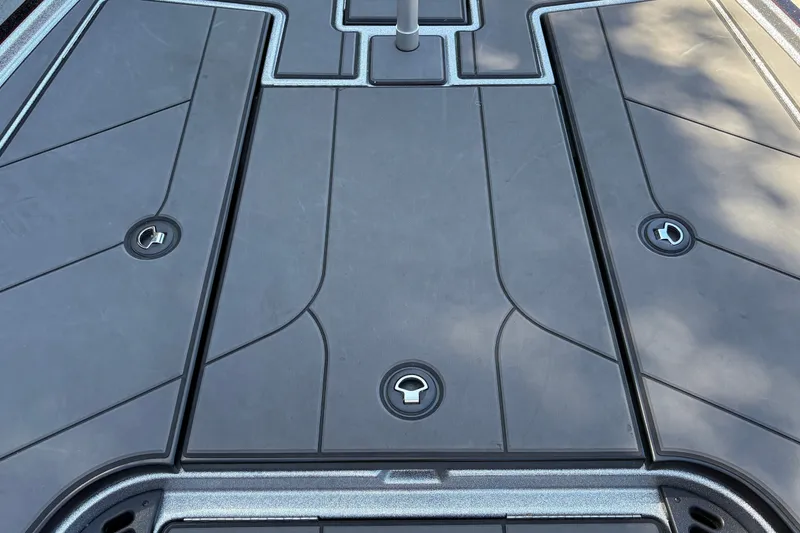 Slide: The Image of 2026 Nitro Z19 XL boat deck with storage compartments and sleek design. - 38