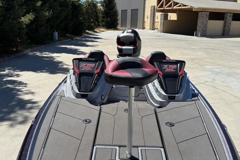 Slide: The Image of 2026 Nitro Z19 XL boat with dual seats and sleek design in a sunny outdoor setting. - 16