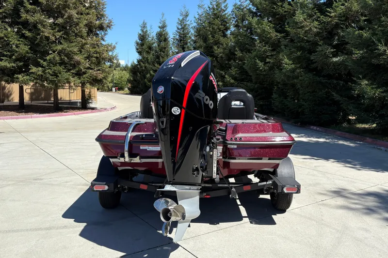 Slide: The Image of 2026 Nitro Z19 XL boat with powerful outboard motor on a trailer. - 10