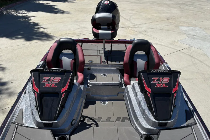 Slide: The Image of 2026 Nitro Z19 XL boat interior with dual seats and sleek design. - 13