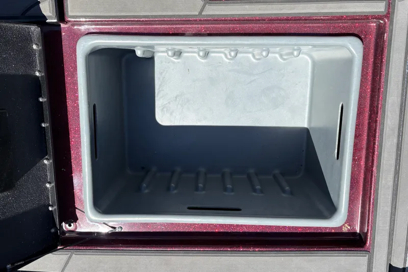 Slide: The Image of Open storage compartment in 2026 Nitro Z19 XL boat, featuring a sleek interior design. - 34