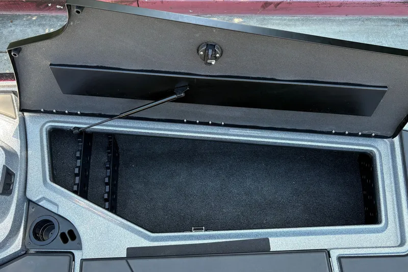 Slide: The Image of Open storage compartment of 2026 Nitro Z19 XL boat, showcasing spacious interior design. - 28