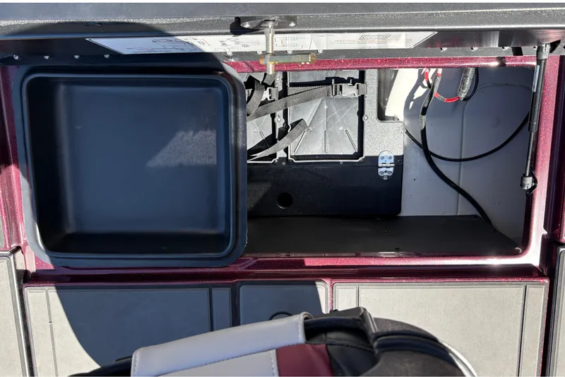 Slide: The Image of Storage compartment of a 2026 Nitro Z19 XL boat, featuring organized interior layout. - 39