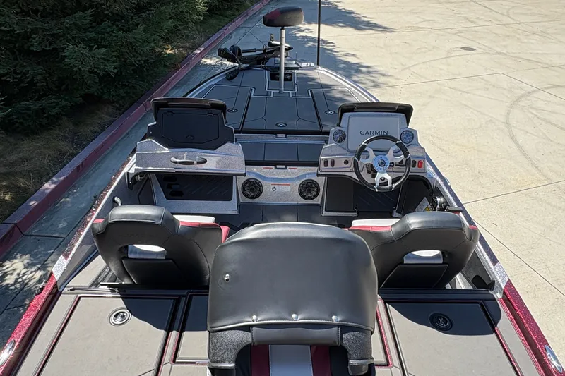 Slide: The Image of 2026 Nitro Z19 XL boat interior with Garmin navigation system and dual seating. - 15