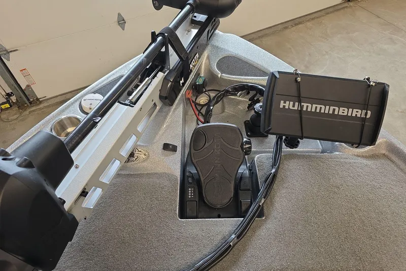 Slide: The Image of 2023 Bass Cat Caracal boat with Humminbird fish finder and Minn Kota trolling motor. - 22