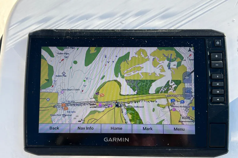 Slide: The Image of Garmin GPS displaying nautical map on 2014 Carolina Skiff 258 DLV boat. - 15