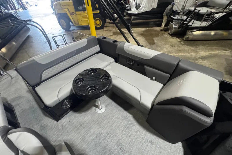 Slide: The Image of Luxurious seating area on 2026 Godfrey Sweetwater 2286 SFL pontoon boat, featuring modern design. - 10