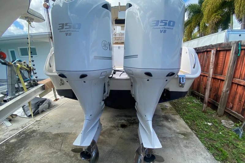 Slide: The Image of 2004 Grady-White Canyon 283 with twin Yamaha 350 V8 outboard engines. - 16