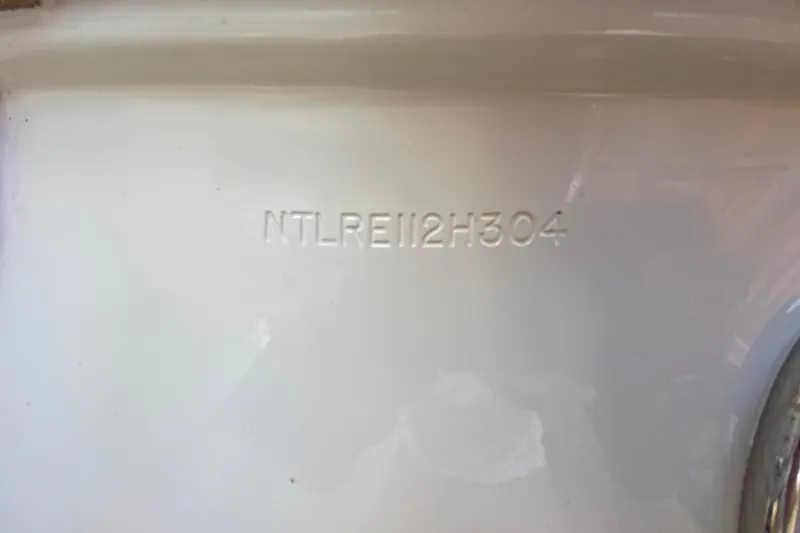 Slide: The Image of Hull identification number on 2004 Grady-White Canyon 283 boat. - 19