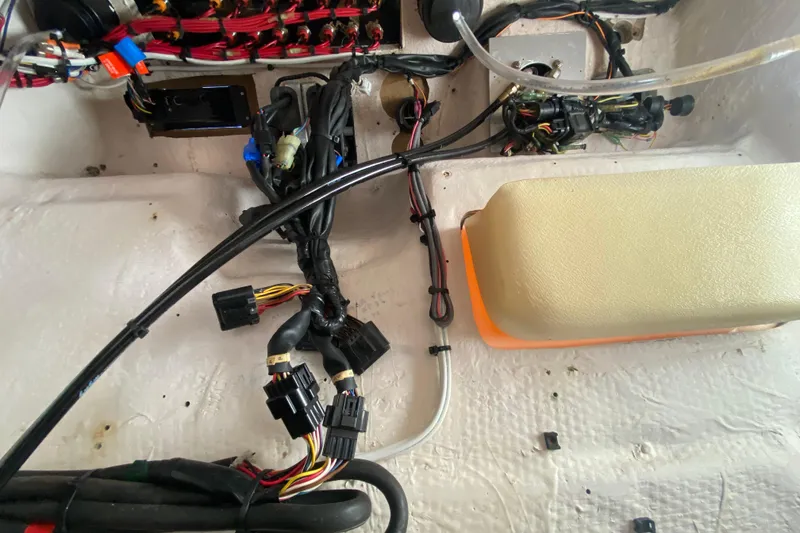 Slide: The Image of Electrical wiring and components inside a 2004 Grady-White Canyon 283 boat. - 65