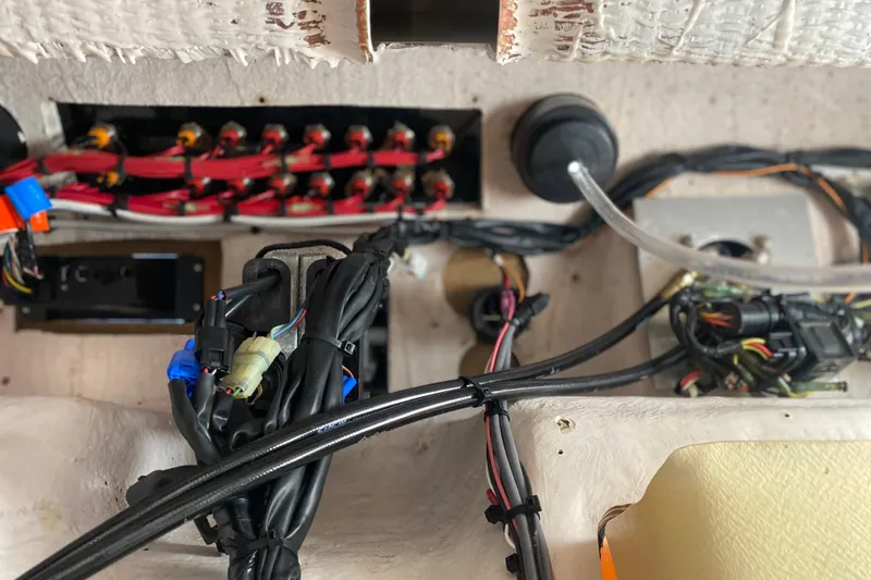 Slide: The Image of Electrical wiring and components inside a 2004 Grady-White Canyon 283 boat. - 66