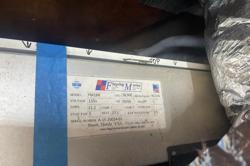 Slide: The Image of 1986 Mainship Mark III Motor Cruiser with Flagship Marine FM18R unit label. - 47