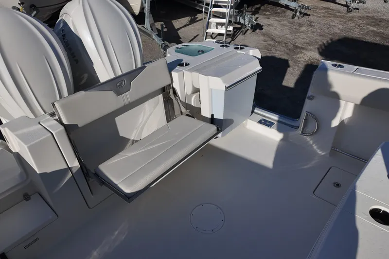 Slide: The Image of 2026 Sailfish 312 CC boat interior with seating and storage compartments. - 20