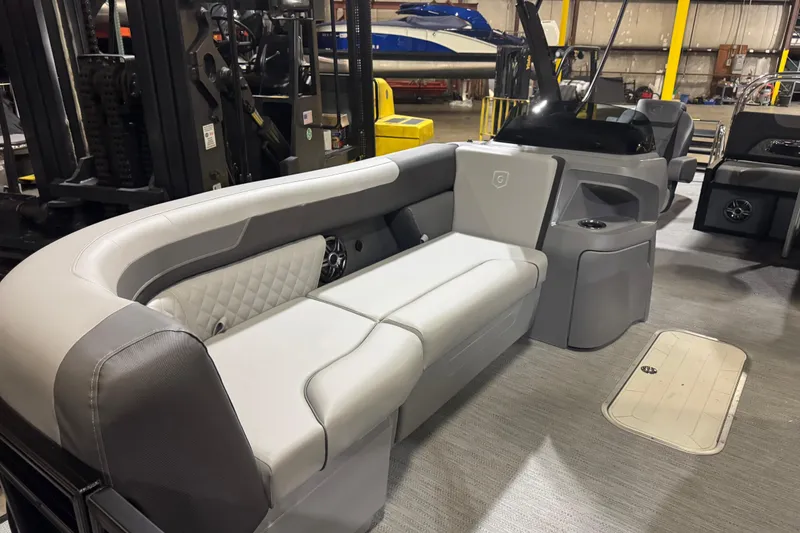Slide: The Image of 2026 Godfrey Sweetwater 2286 SFL pontoon boat interior with luxurious seating and modern design. - 5