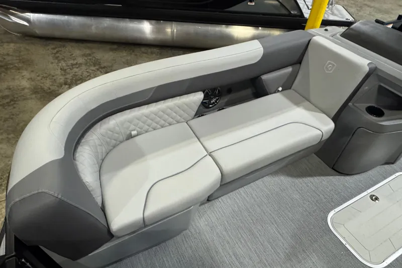 Slide: The Image of 2026 Godfrey Sweetwater 2286 SFL boat interior with elegant gray seating and quilted design. - 4