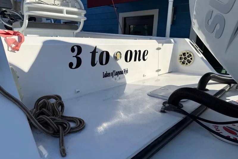 Slide: The Image of 2002 Monza 26 boat with "3 to one" name, docked at Lakes of Laguna Wpb. - 1