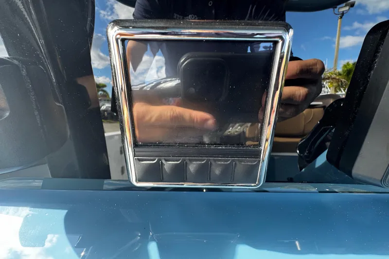 Slide: The Image of Close-up of 2026 Sea Pro 292 DLX boat dashboard with reflective screen. - 20