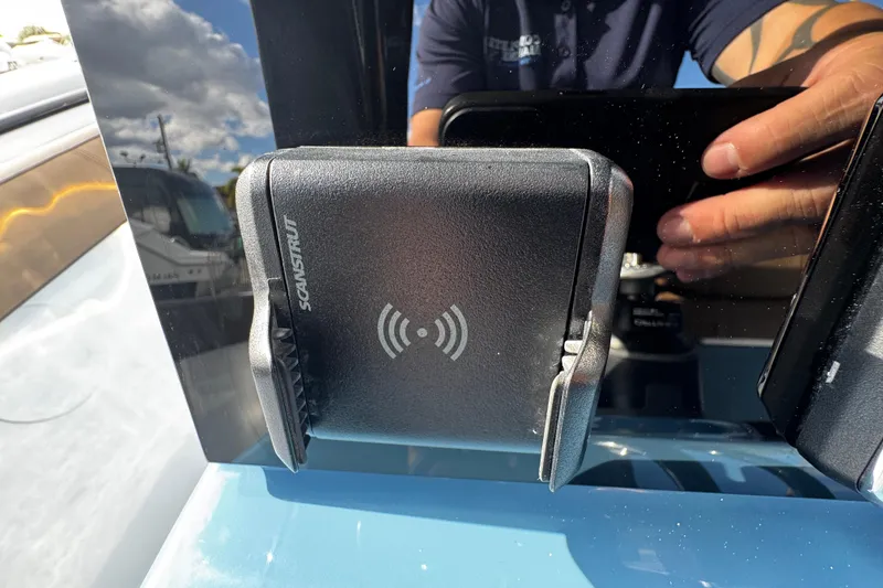 Slide: The Image of 2026 Sea Pro 292 DLX boat with Scanstrut wireless charging mount. - 22