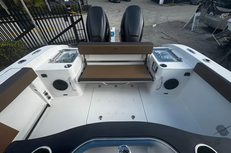 Slide: The Image of 2026 Sea Pro 292 DLX boat interior with seating and storage compartments. - 3