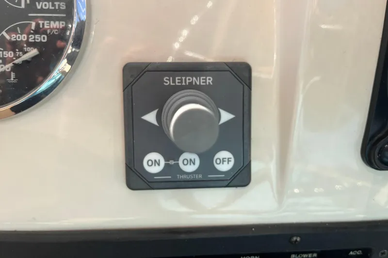 Slide: The Image of Control panel of 2009 Mainship Pilot 31 with Sleipner thruster switch. - 28