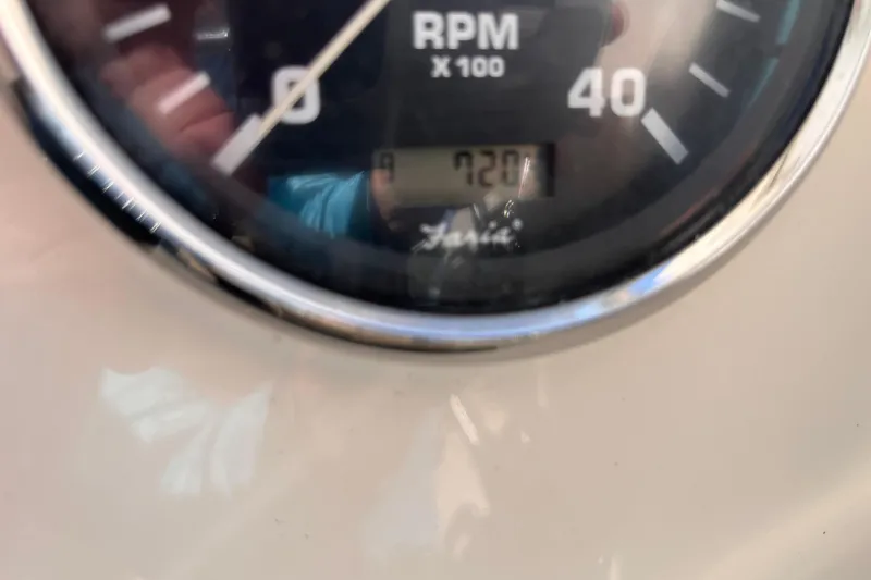Slide: The Image of Close-up of RPM gauge on 2009 Mainship Pilot 31 boat, showing 720 hours. - 29