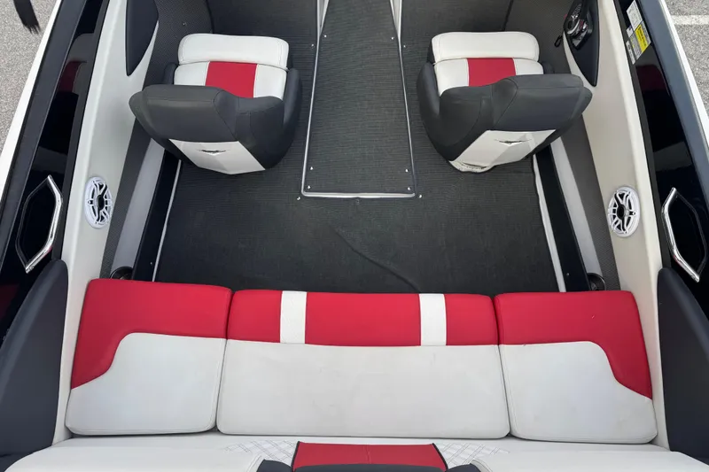 Slide: The Image of 2015 Glastron GTS 187 boat interior with red and white seating. - 19