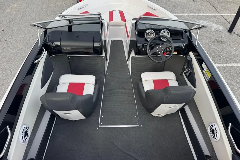 Slide: The Image of 2015 Glastron GTS 187 boat interior with dual seats and dashboard view. - 20