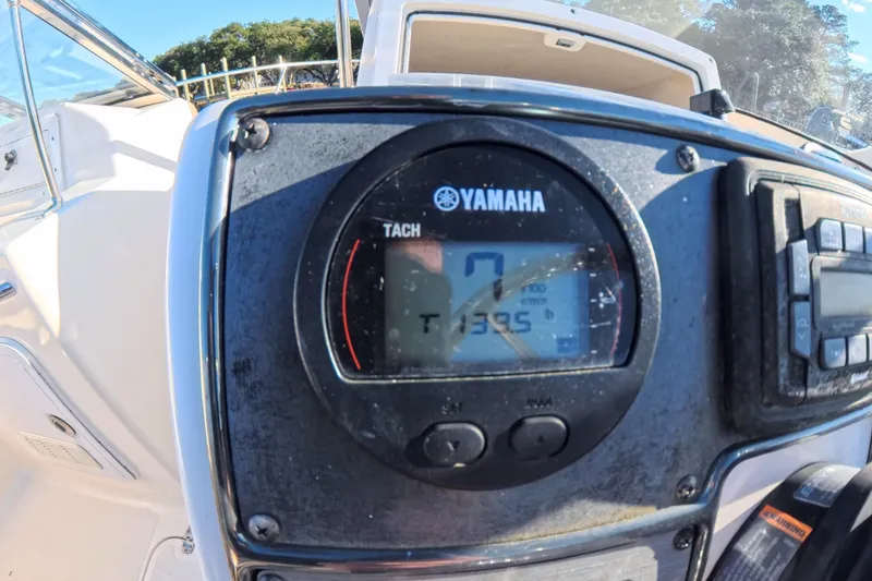 Slide: The Image of Yamaha tachometer on 2017 Scout 210 Dorado boat dashboard, displaying engine hours. - 30