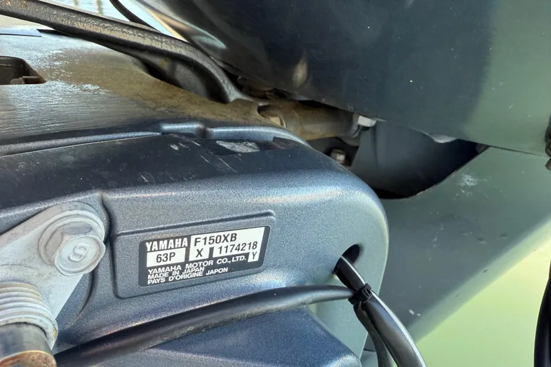Slide: The Image of Close-up of a Yamaha F150XB engine on a 2017 Scout 210 Dorado boat. - 36