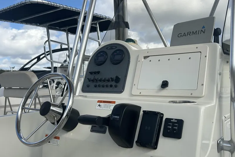 Slide: The Image of 2005 Hydra-Sports 212 CC boat console with Garmin navigation system and steering wheel. - 16