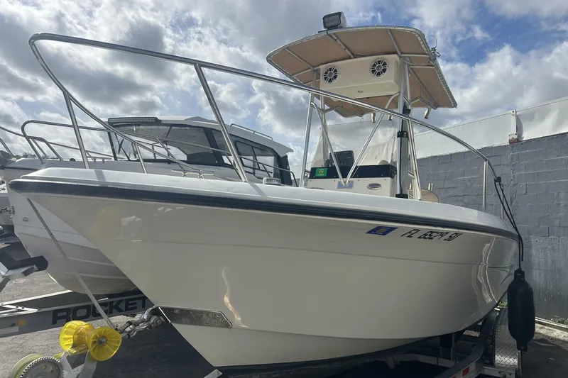 Slide: The Image of 2005 Hydra-Sports 212 CC boat on trailer under cloudy sky. - 3