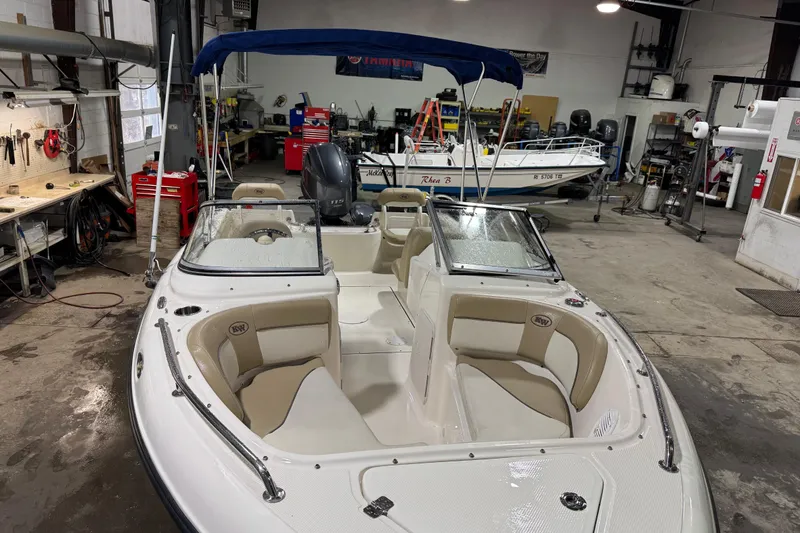 Slide: The Image of 2015 Key West 186 Dual Console boat in a workshop setting. - 12