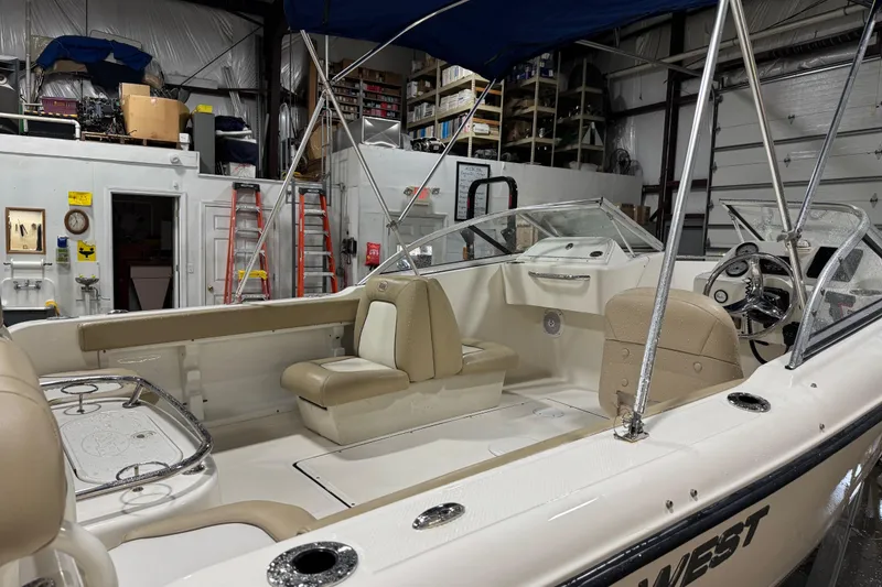 Slide: The Image of 2015 Key West 186 Dual Console boat interior in a storage facility. - 7