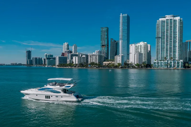 Slide: The Image of Azimut 48 Flybridge yacht cruising near city skyline, 2012 model. - 4