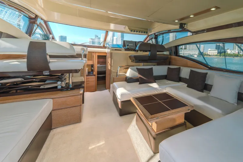 Slide: The Image of Luxurious interior of 2012 Azimut 48 Flybridge yacht with modern seating and city view. - 14