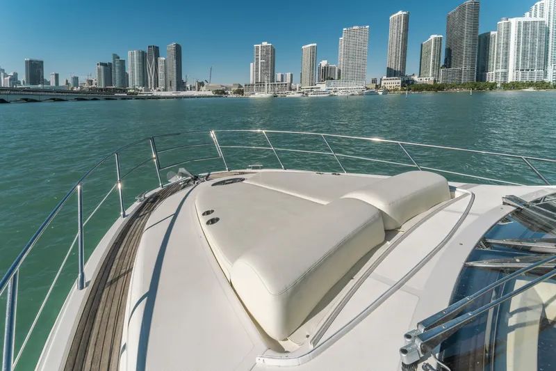 Slide: The Image of 2012 Azimut 48 Flybridge yacht with city skyline in the background. - 5