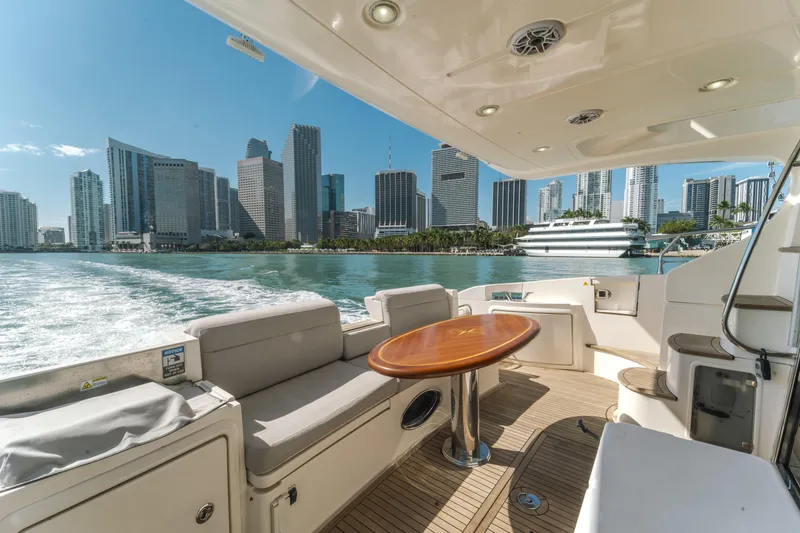 Slide: The Image of Azimut 48 Flybridge 2012 yacht cruising with city skyline view in the background. - 8