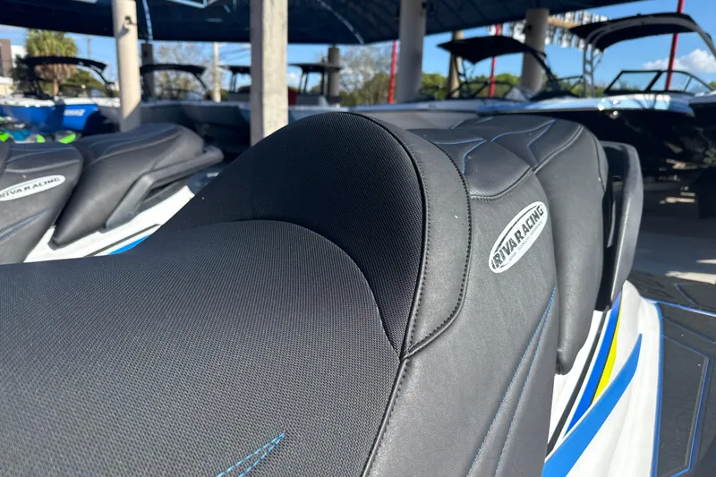 Slide: The Image of 2019 Yamaha WaveRunner VXR with Riva Racing seat, parked under a canopy. - 7