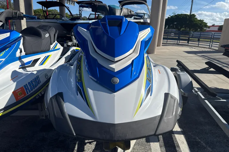 Slide: The Image of 2019 Yamaha WaveRunner VXR in blue and white, parked on a trailer. - 9